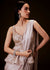 Champion Peach Sequence Embroidered Peplum Top With Saree