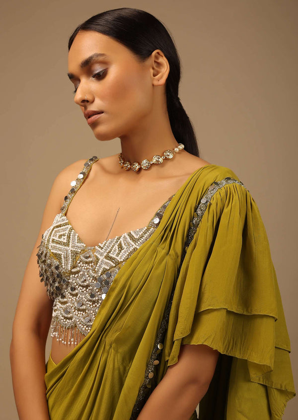 Moss Green Ready To Wear Ruffle Saree With A Heavy Sequins And Cut Dana Embroidered Crop Top