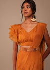 Rust Orange Pre Drape Saree With Fancy Ruffle Blouse And Embroidered Belt